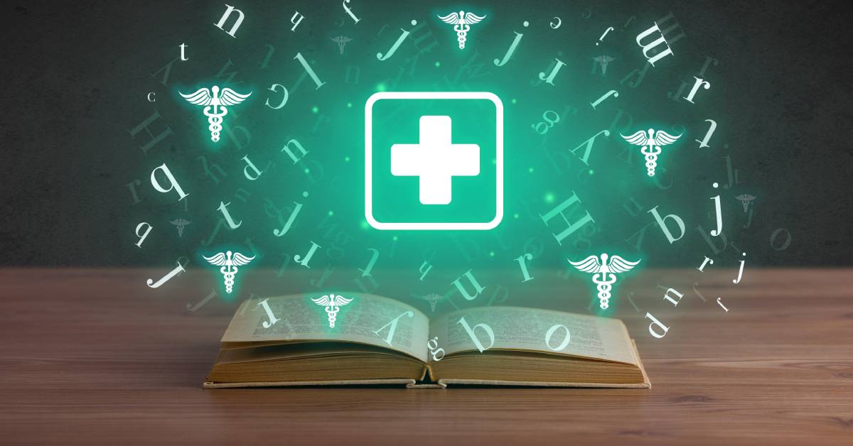 An open book with a first aid symbol, a few medical symbols, and a bunch of letters popping out of it.