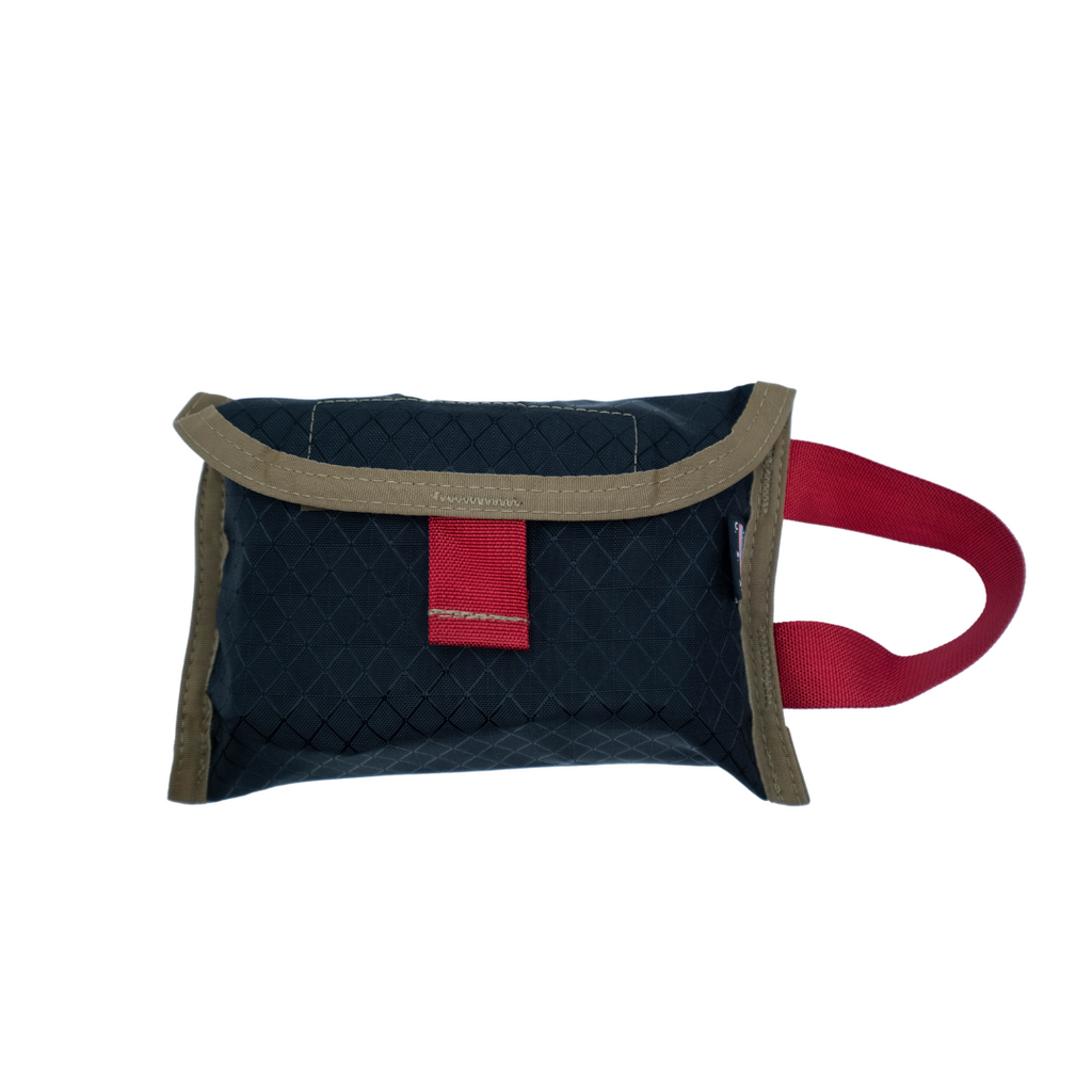 Refuge Medical POC-Kit First Aid Kit - Black with tan trim, red side handle and red pull open tab