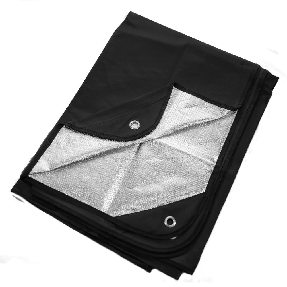A black survival blanket with reverse reflective silver back and black reinforced tie-down grommets, displayed on a white background.