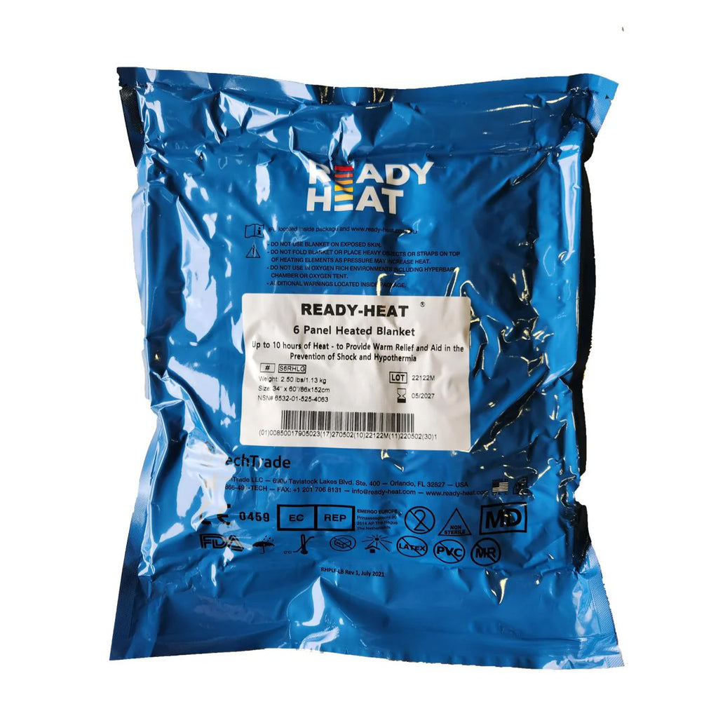 A packaged Ready Heat blanket in blue, sealed in plastic, with label information visible. 6 panel 34" x 60"