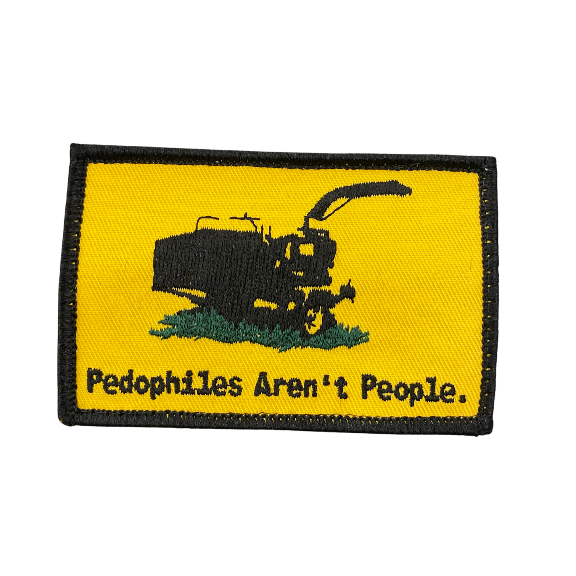A patch with a yellow background featuring a black illustration of a chipper and the text 'Pedophiles Aren't People.'