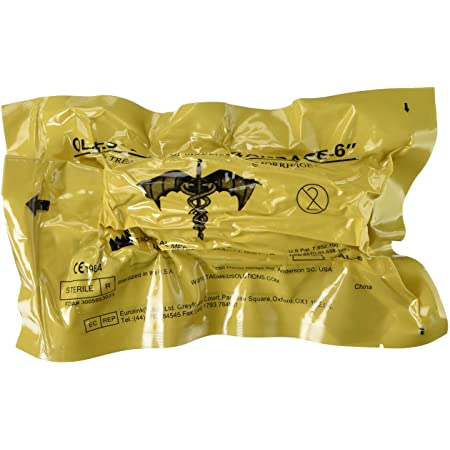 A packaged OLAES Modular Bandage in yellow, with branding and instructions visible on the packaging.